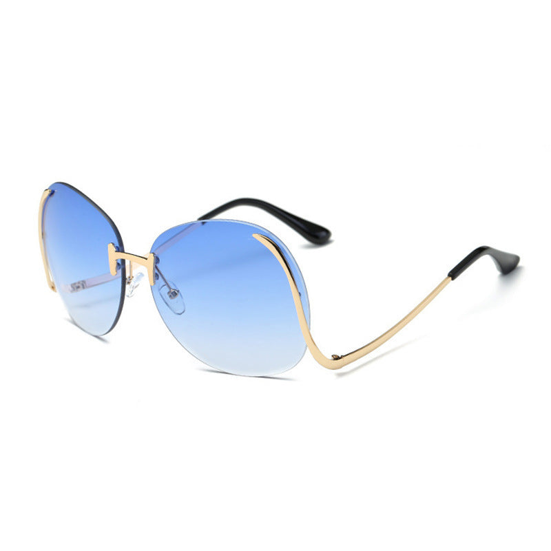 Lunettes de soleil sans monture à branches incurvées et décoratives