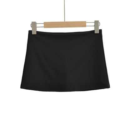 Jupe courte taille basse de sport rétro extensible coupe slim pour femme