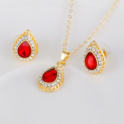Ensemble de bijoux trois pièces exquis en alliage multicolore : collier et boucles d'oreilles goutte d'eau