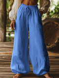 Pantalon ample décontracté de style artistique avec poches, cordon de serrage et taille élastique