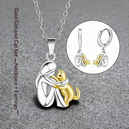 Ensemble de boucles d'oreilles Fillette et Chien s'enlaçant