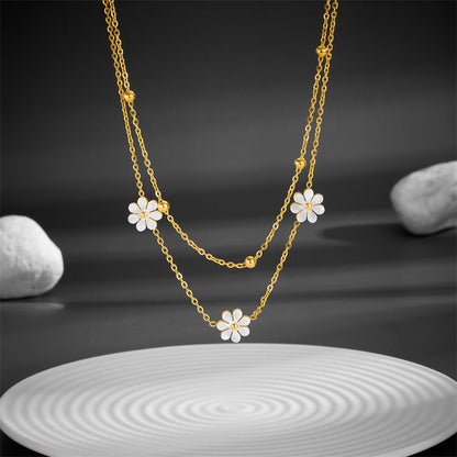 Bijoux fantaisie en acier inoxydable, collier double couche avec pendentif fleur marguerite et boucles d'oreilles.