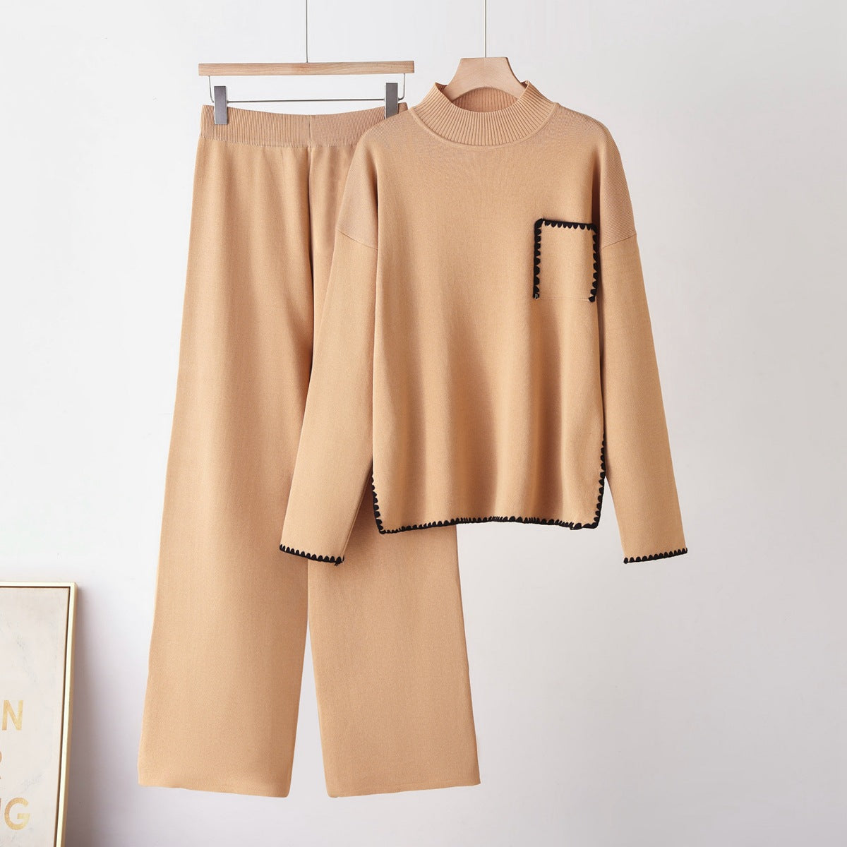 Elevate your everyday style with this sophisticated two-piece knit set.