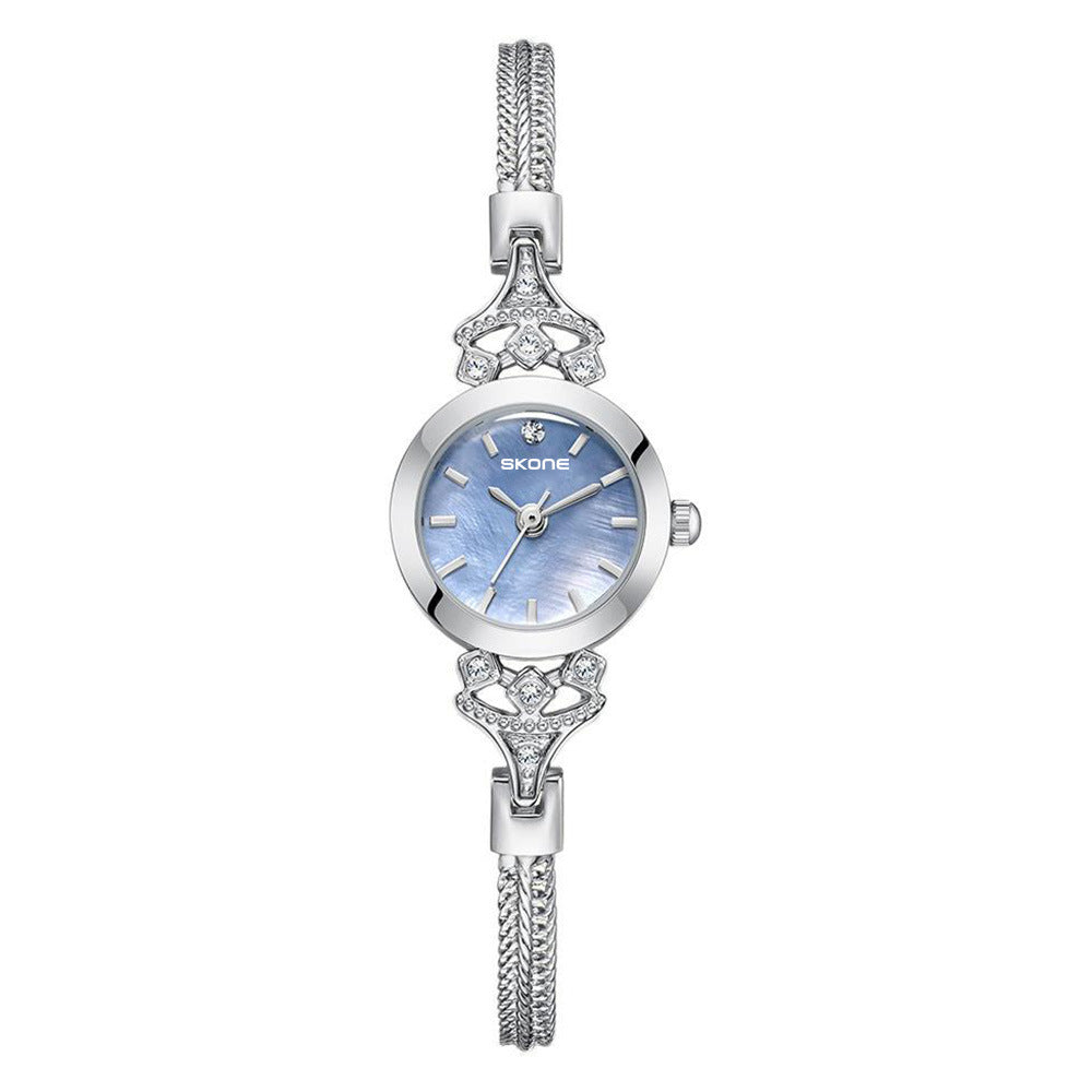 Reloj de cuarzo impermeable, pequeño, exquisito y de primera calidad para mujer