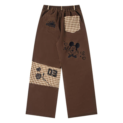 Cartoon embroidered checkered patchwork jeans