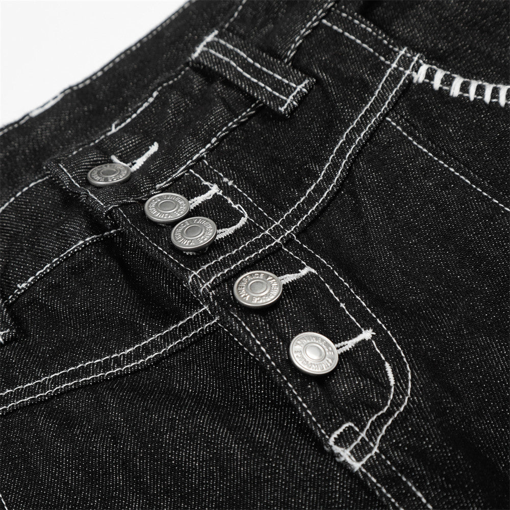 Pantalon de travail à jambe droite, boutonné, longueur cinq-quarts, avec poches et coutures color block.