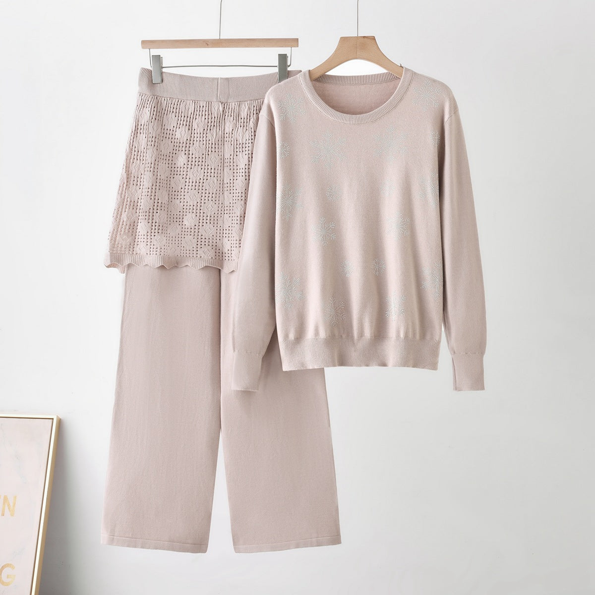 Elevate your everyday style with this sophisticated two-piece knit set.