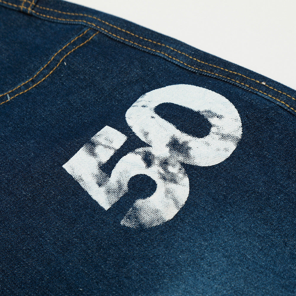 Pantalon large en jean imprimé et peint