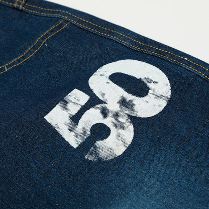 Pantalon large en jean imprimé et peint