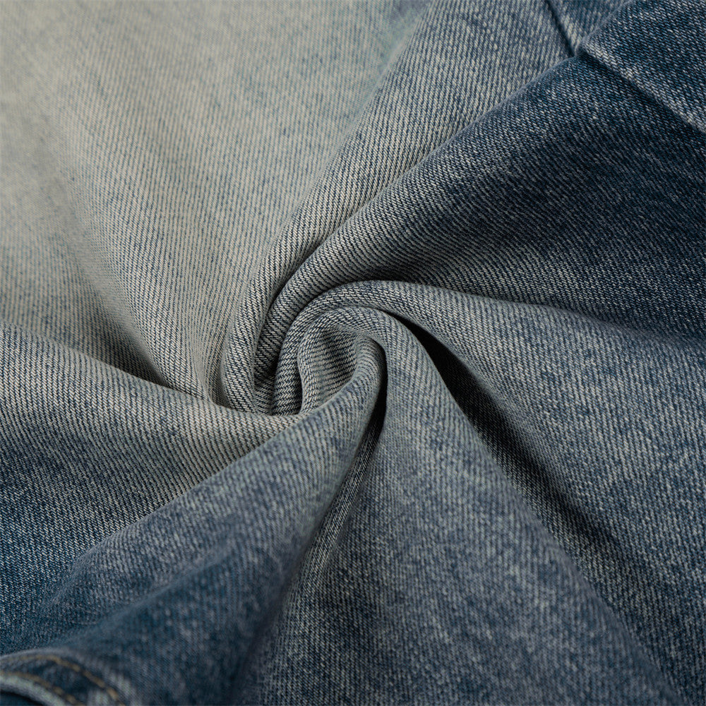 Vaqueros de mezclilla lavada y pulida con bloques de color