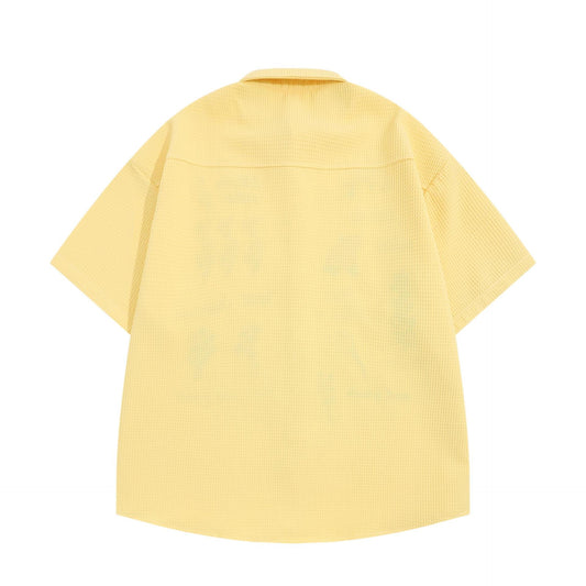 Chemise à manches courtes brodée florale couleur gaufre