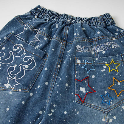 Wash and make old splashed ink jeans