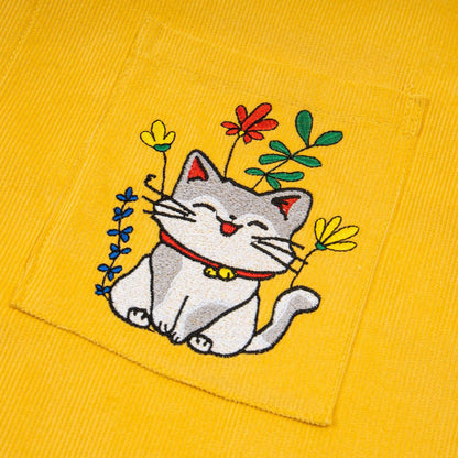 Embroidered corduroy short-sleeved shirt; yellow fabric with cat and flower embroidery on the pocket