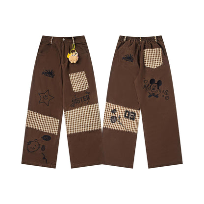 Cartoon embroidered checkered patchwork jeans