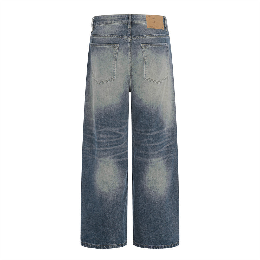 Vaqueros de mezclilla lavada y pulida con bloques de color