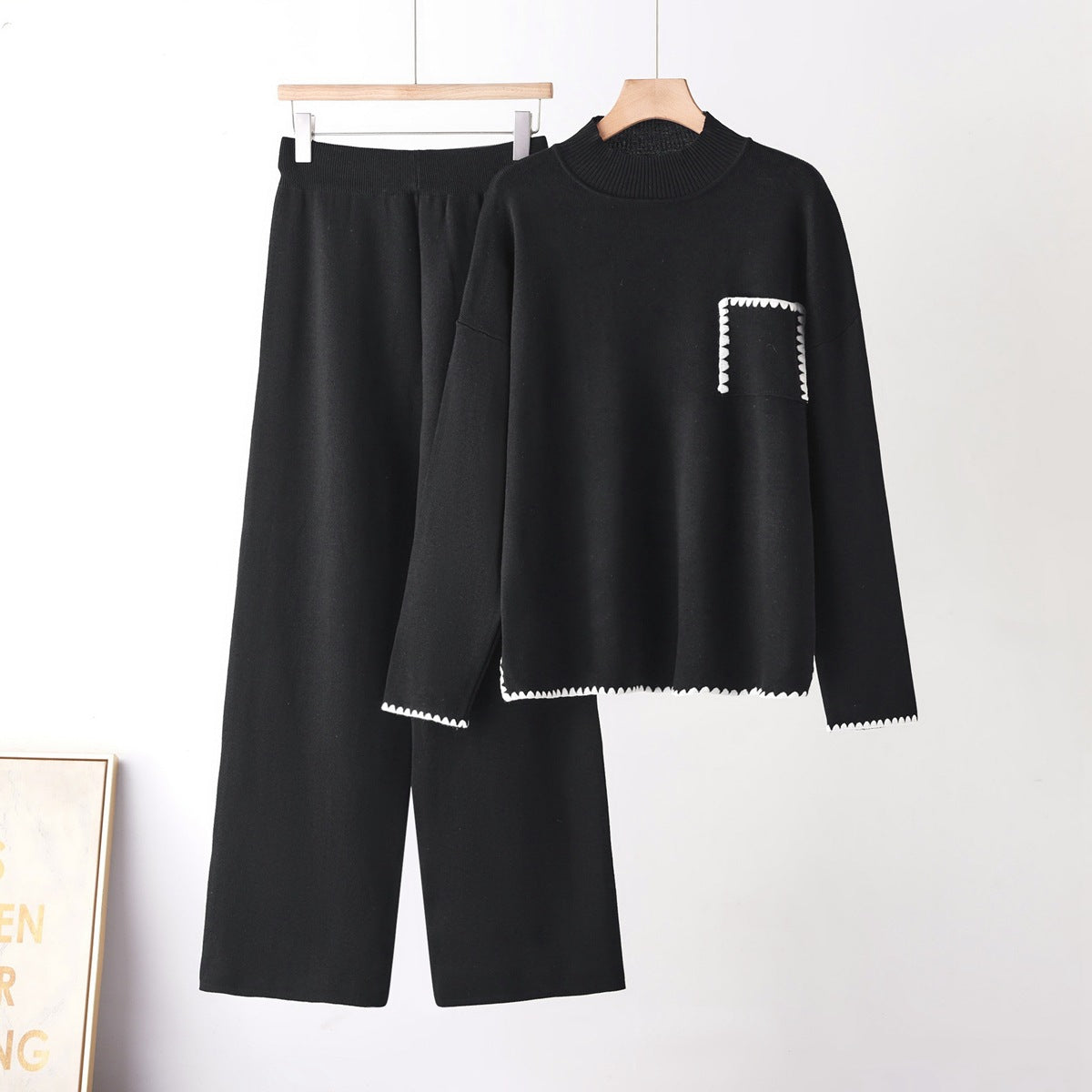 Elevate your everyday style with this sophisticated two-piece knit set.