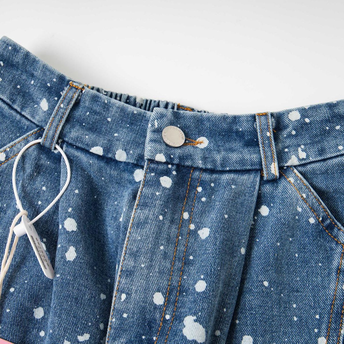 Wash and make old splashed ink jeans