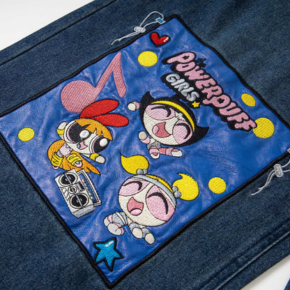 Jeans usés à broderies de dessins animés
