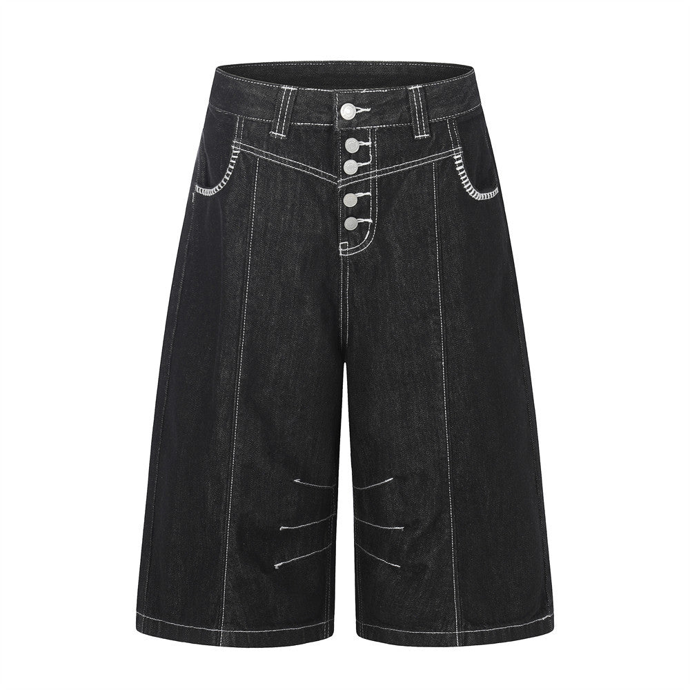 Pantalon de travail à jambe droite, boutonné, longueur cinq-quarts, avec poches et coutures color block.