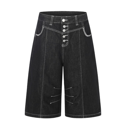 Pantalon de travail à jambe droite, boutonné, longueur cinq-quarts, avec poches et coutures color block.