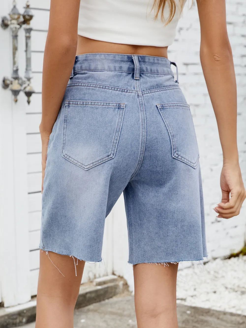 Shorts vaqueros con bajo sin rematar lavados