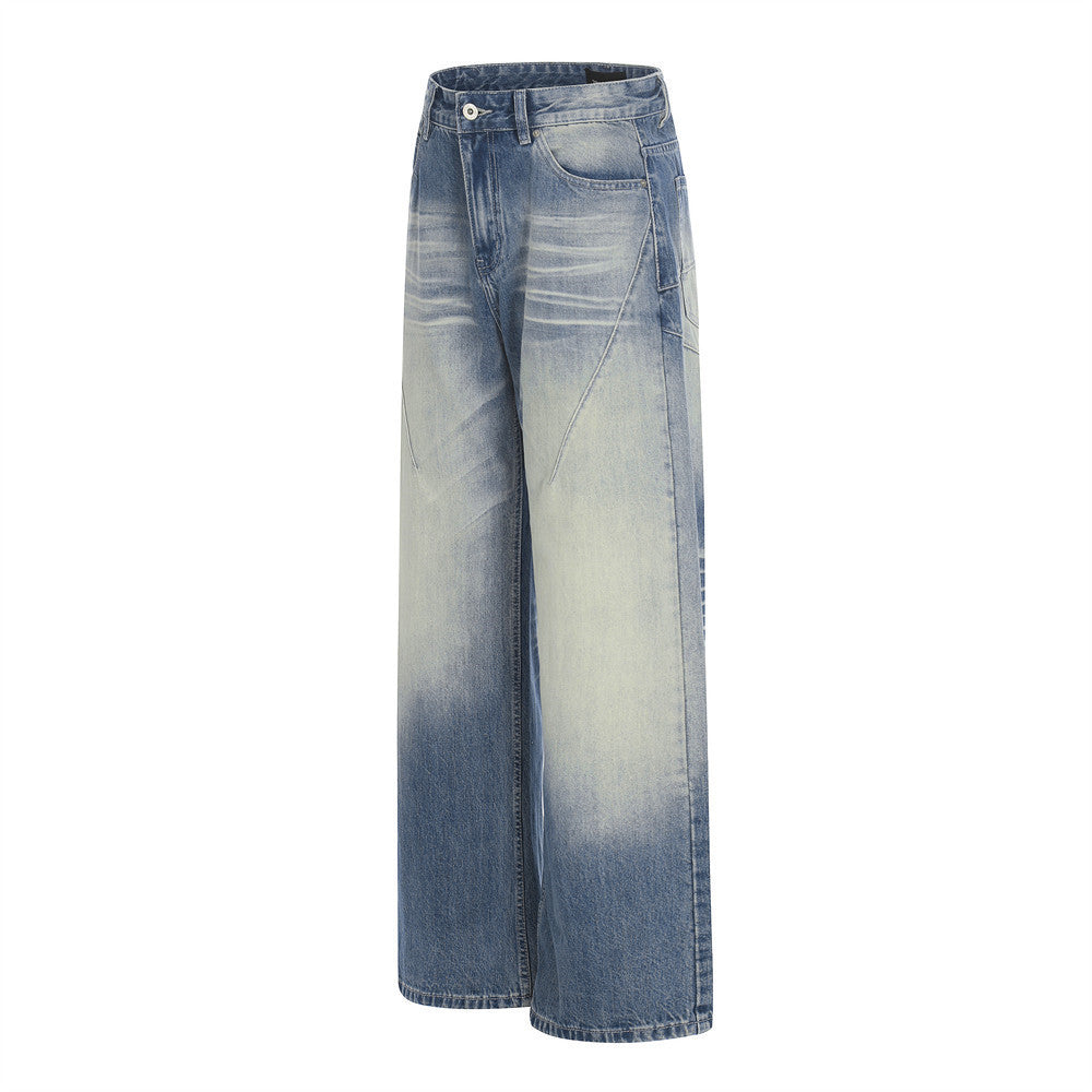 Jeans en jean délavé et poli à empiècements de couleur