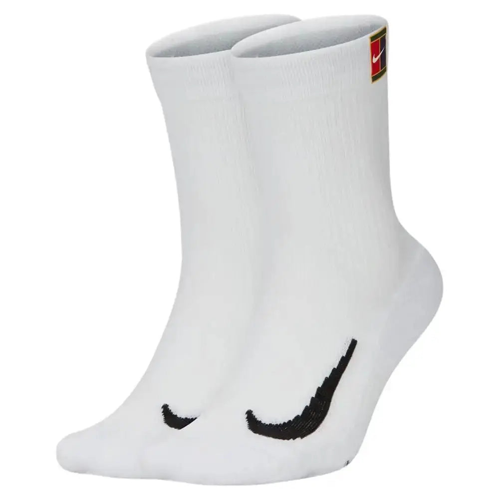 Nike white crew socks, pair with thick-pile terry sole and non-slip grip, black swoosh.