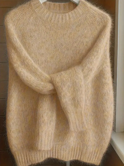 Womens soft cozy knit sweater in cream beige with fuzzy texture