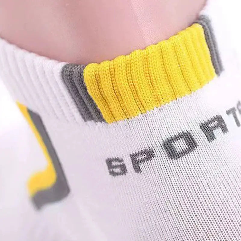 Men's striped cotton ankle socks, breathable and sweat-absorbent, white with yellow ribbed cuff.