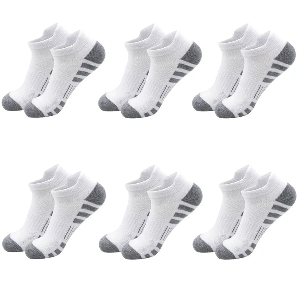 Breathable cushioned athletic ankle socks, set of six white socks with gray toes and heels.