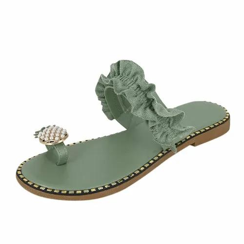 Pineapple Pearl Beach Slides green flat sandal with a ruffled strap and pearl pineapple charm