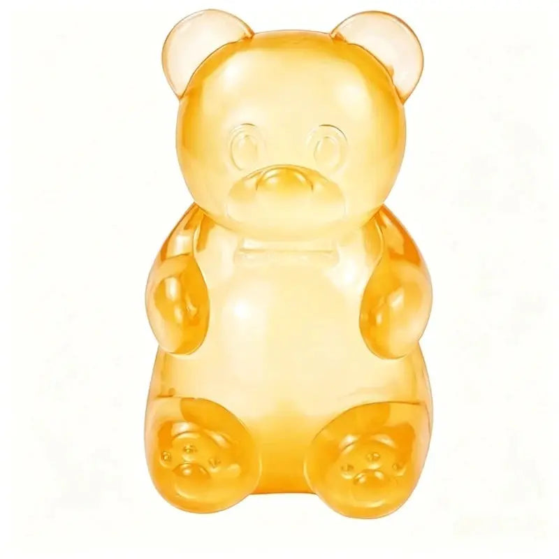 Soft gummy bear fidget squeeze toy in amber translucent plastic