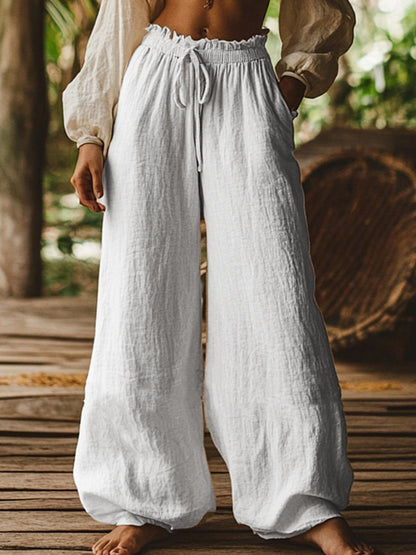 Pantalon ample décontracté de style artistique avec poches, cordon de serrage et taille élastique