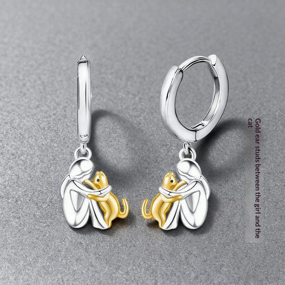 Ensemble de boucles d'oreilles Fillette et Chien s'enlaçant