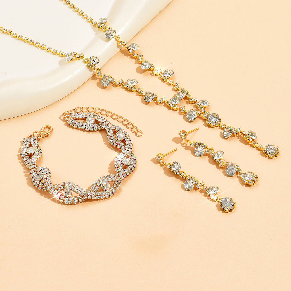 Collier en cristal, boucles d'oreilles et bracelet tendance