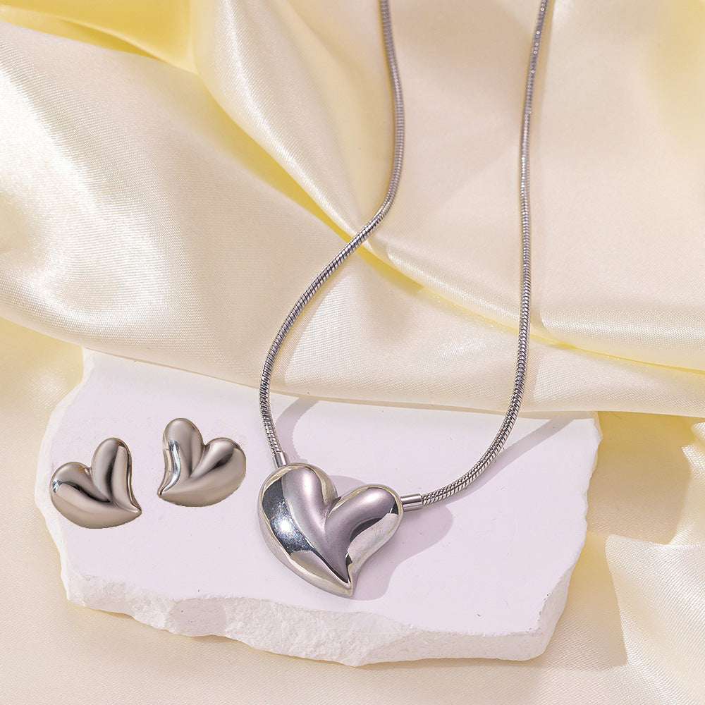 Juego de joyas de acero inoxidable para mujer: collar y pendientes