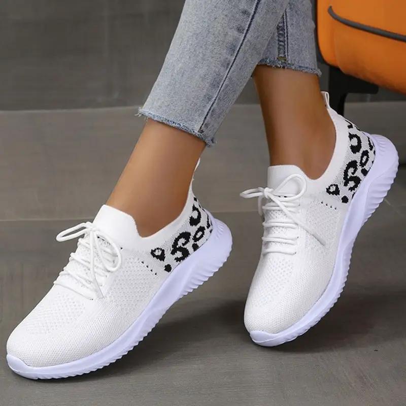White leopard-print lace-up sneakers for women by AdTec, knit mesh upper, pair of shoes