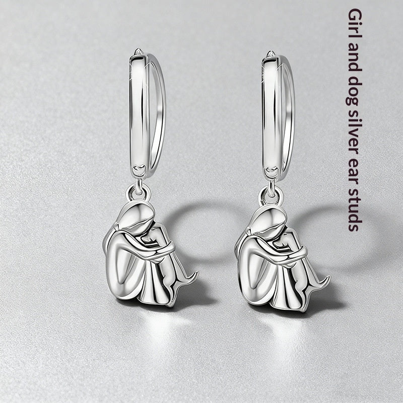 Ensemble de boucles d'oreilles Fillette et Chien s'enlaçant