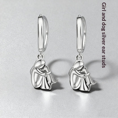 Ensemble de boucles d'oreilles Fillette et Chien s'enlaçant