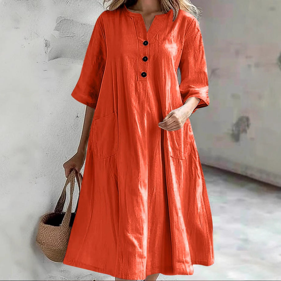 Combinaison ample à trois boutons et poches pour femme