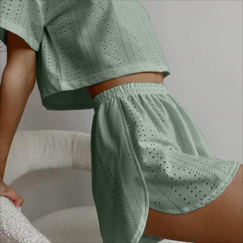 Ensemble décontracté 2 pièces avec haut court à manches courtes et short fendu élastique, vêtements de sport d'été à la mode pour femmes