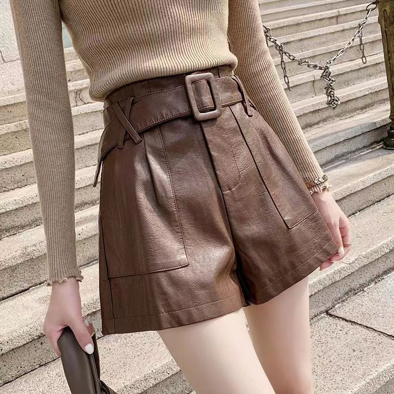 Pantalones versátiles de piel de talle alto para mujer