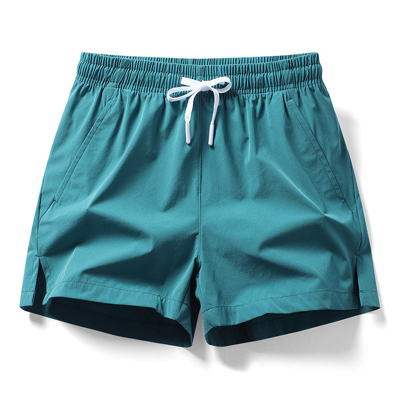 Shorts de sport fendus en soie glacée extensibles pour femmes