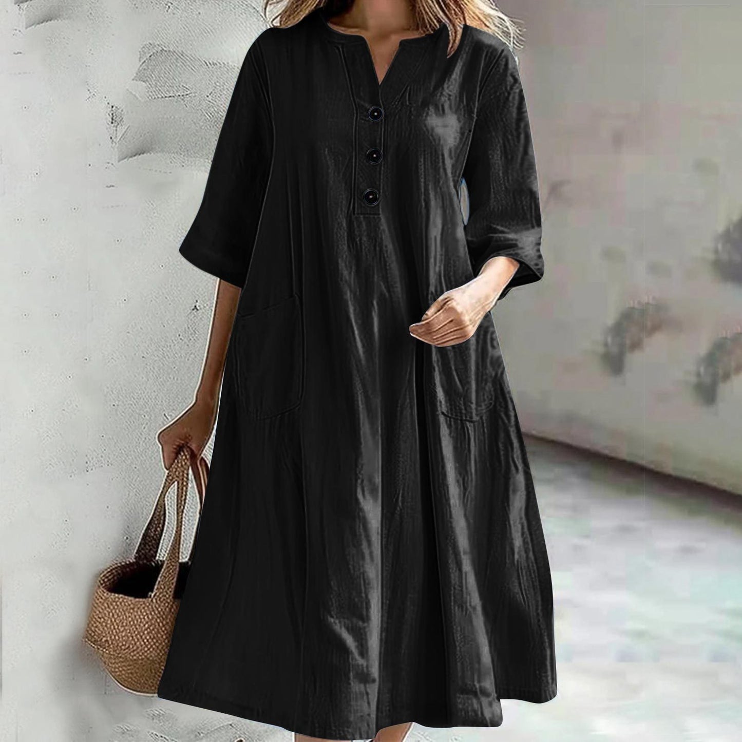Combinaison ample à trois boutons et poches pour femme