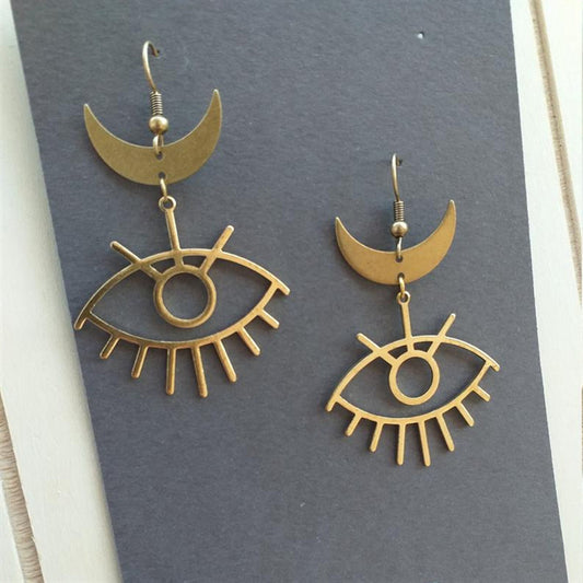 Boucles d'oreilles pendantes gothiques simples en forme de croissant et de grands yeux, très prisées