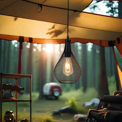Battery Operated Hanging Lamp by JHY DESIGN with black wire-mesh shade, warm glow in a camping tent