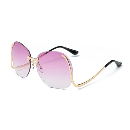 Lunettes de soleil sans monture à branches incurvées et décoratives