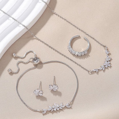 Ensemble de bijoux élégant et simple incrusté de zircon, collier fleur argent, boucles d'oreilles exquises, bracelet et bague, adapté aux femmes pour un usage quotidien ou en vacances