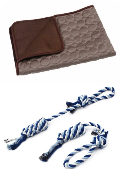 Summer Cooling Ice Silk Pet Sleeping Mat in beige with brown underside, plus blue and white rope toys