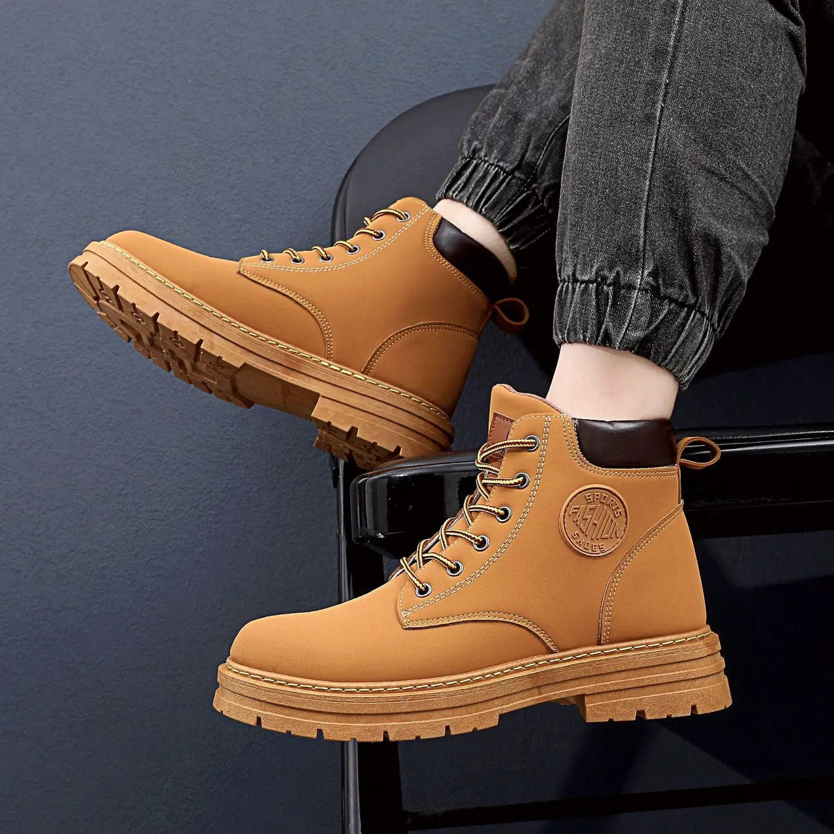 Atlas Mens Waterproof Winter Boots by AdTec, pair of tan leather boots with rugged lug soles.